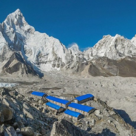 Scenic Village Nestled Amidst Majestic Mountains